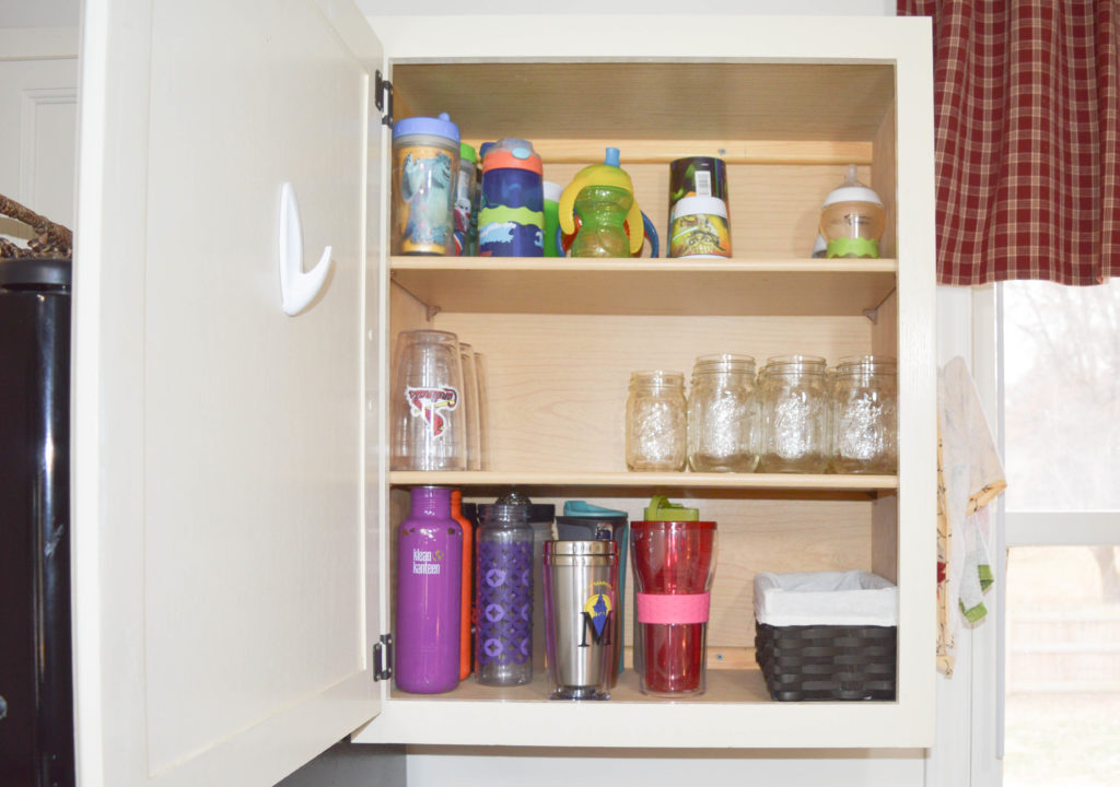 Kitchen storage idea for cups and drink bottles cupboard  Kitchen cupboard  organization, Mug storage, Kitchen organization