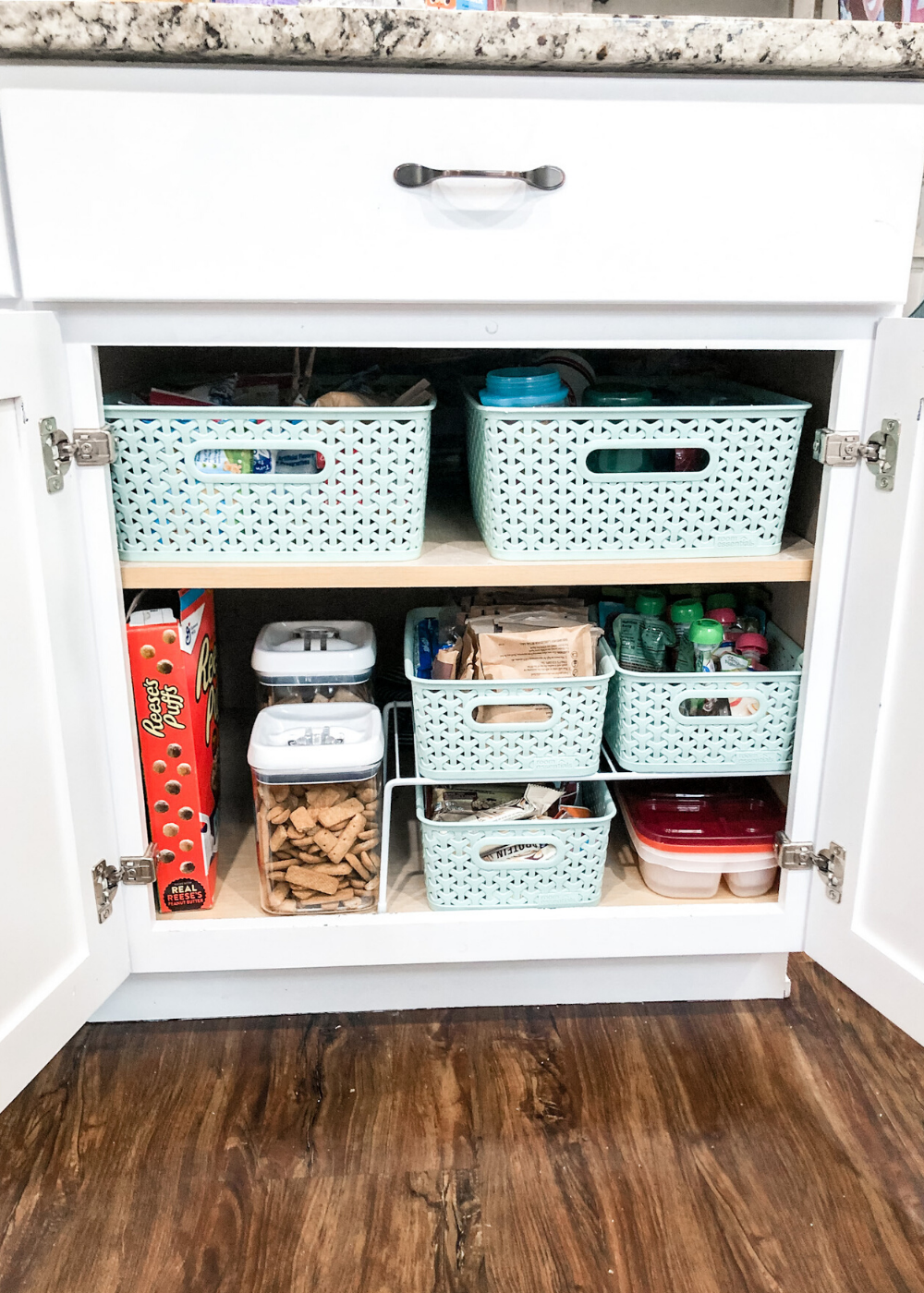 https://www.thesimplyorganizedhome.com/wp-content/uploads/2020/02/Kitchen-Organization-Snack-Cabinet.png